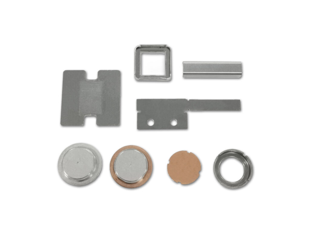 Stamped battery cover components and copper busbar parts for power battery packs