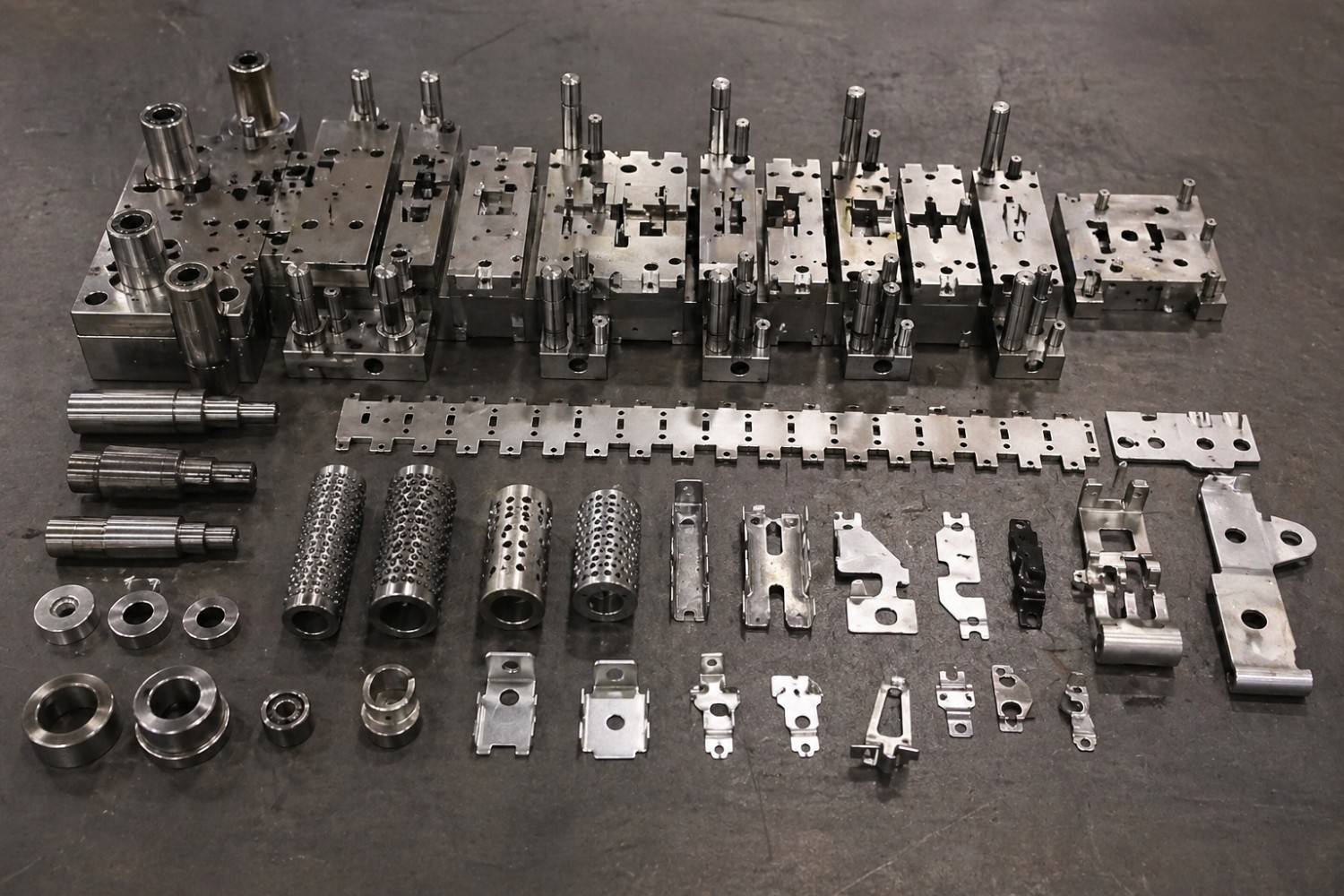 High precision progressive die stamped metal bracket components by SSP Precision