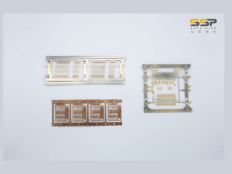 Custom stamped lead frames and contact strips in copper alloy, made to order on SSP precision stamping dies