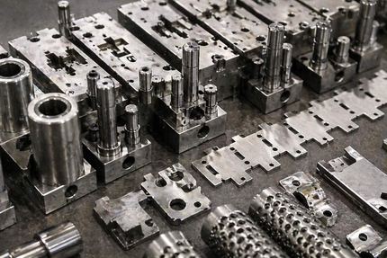 Progressive stamping die — multi-station tooling
